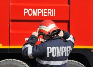 Zeci de mașini cuprinse de flăcări la un service auto din Buzău