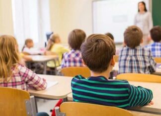 Masca, obligatorie pentru copii doar în recreație