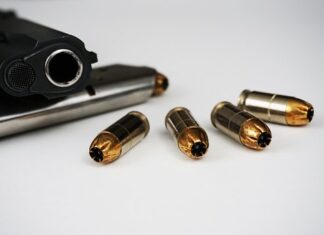 Un incărcător cu gloanţe, pierdut de un polițist din București, găsit la o groapă de gunoi din Ilfov gloante